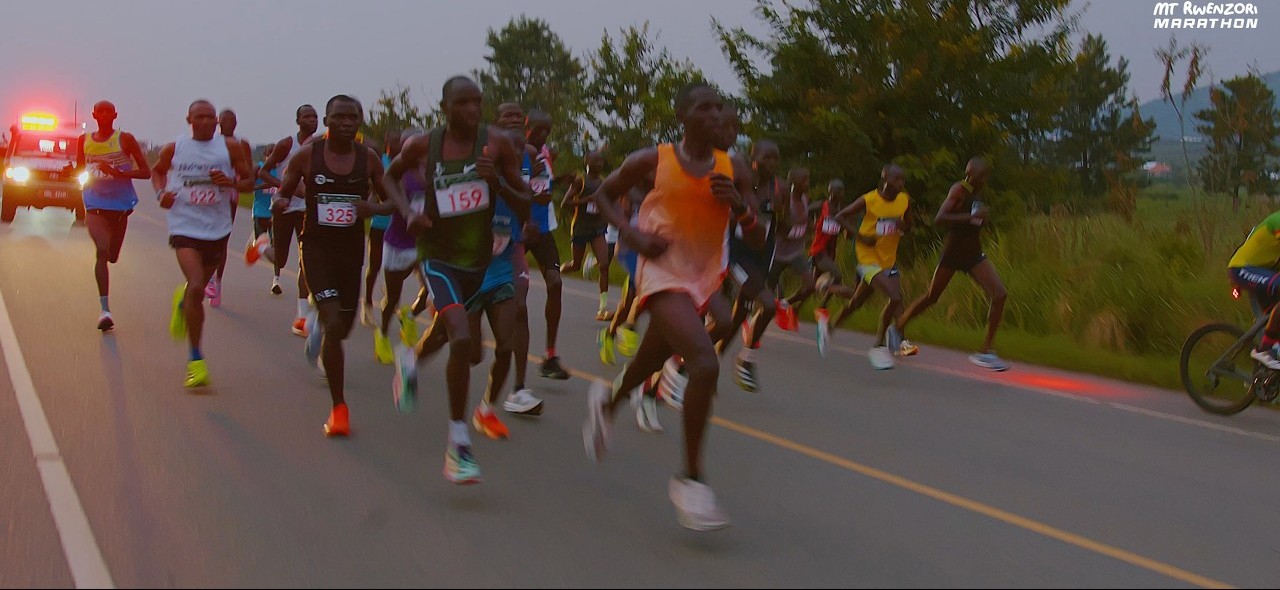 Elite runners leading the pack on an early-morning road